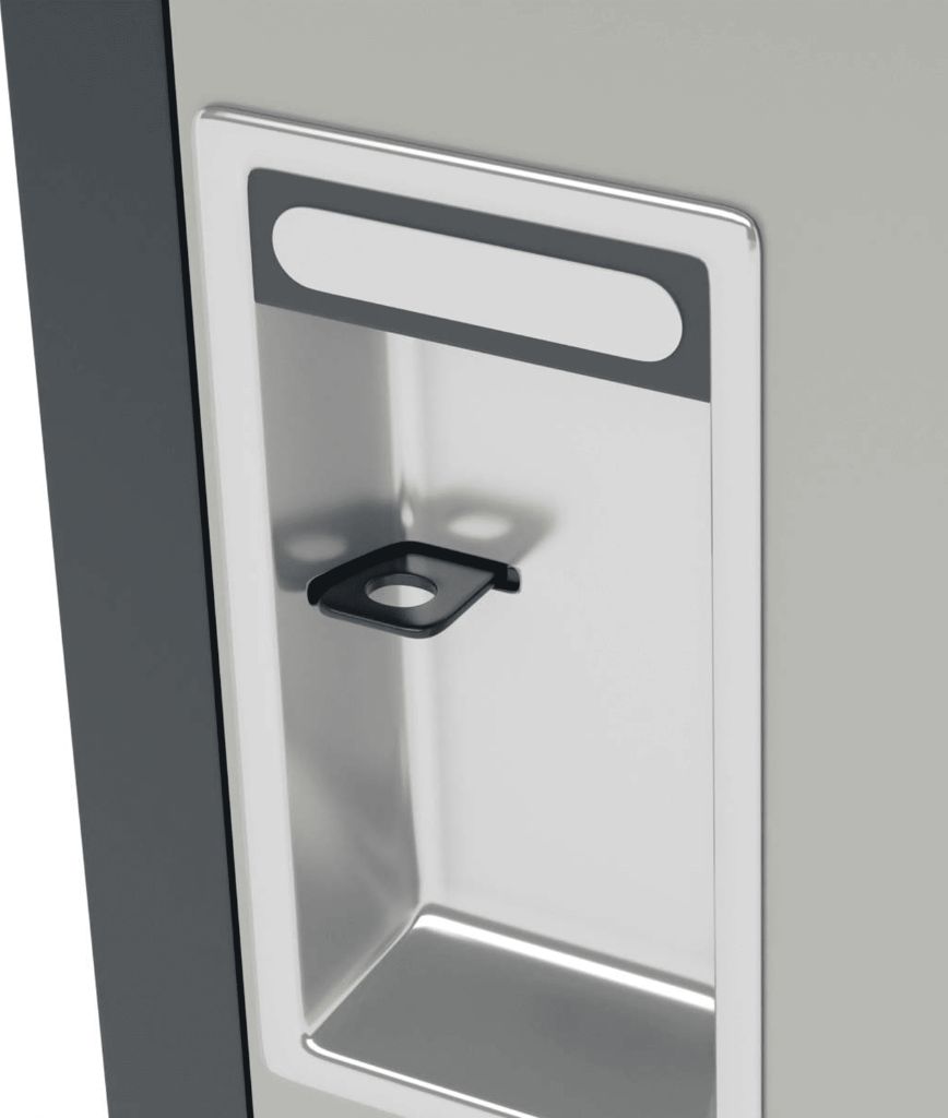 Close-up of a gray and silver water dispenser with a recessed area and a black plastic lever for dispensing water. The design is modern and minimalistic.