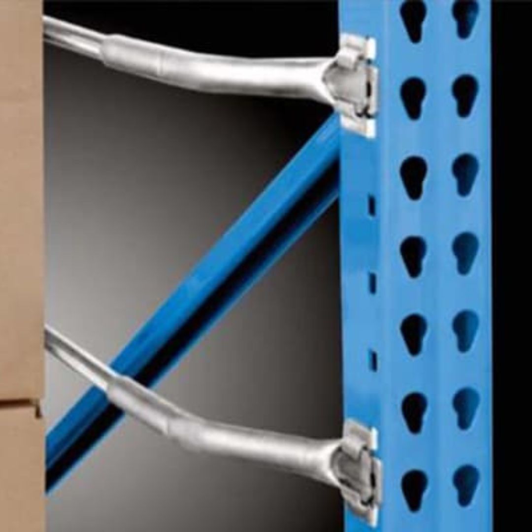 Close-up of a blue metal warehouse storage rack with perforated holes and diagonal support bars, designed for optimal Warehouse Fire Safety; part of a cardboard box is visible on the left side of the image.