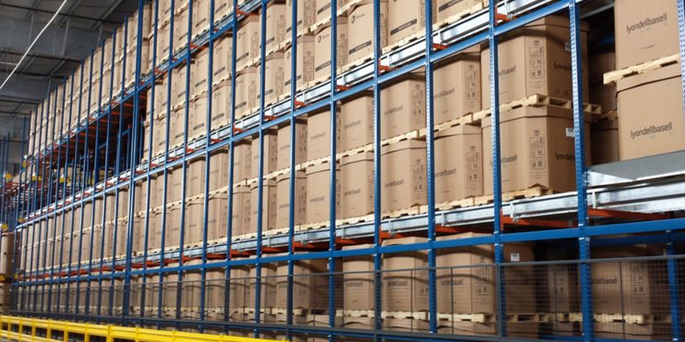 Tall pallet rack rows stacked to the ceiling to maximize warehouse cube utilization