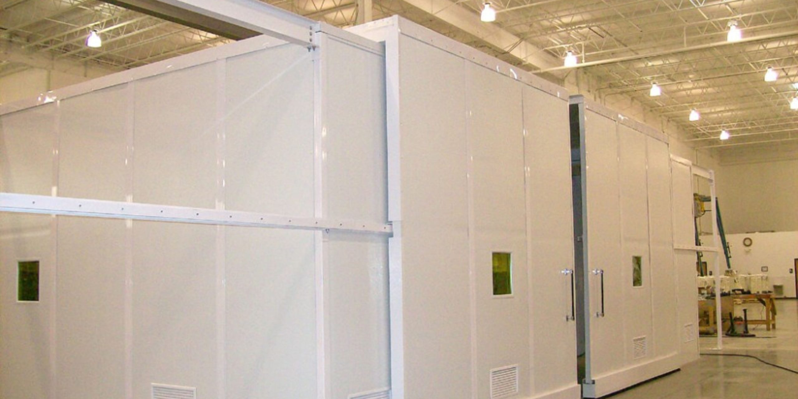 Industrial sound enclosure reducing noise from equipment