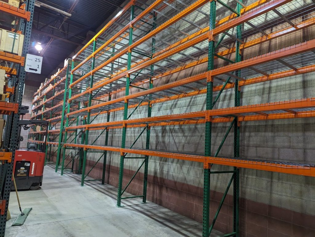 New selective pallet rack installation along warehouse wall at Motion Industries Salt Lake City Utah