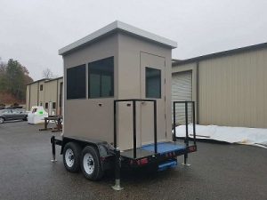 Portable trailer-mounted guard shack