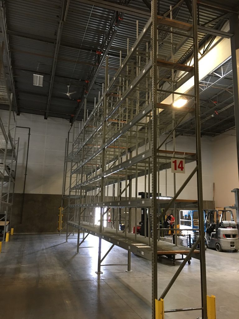 Pallet rack aisle in the Safelite AutoGlass reconfiguration case study