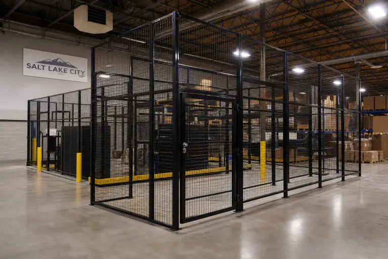 Wire mesh security cage installation in a Salt Lake City warehouse