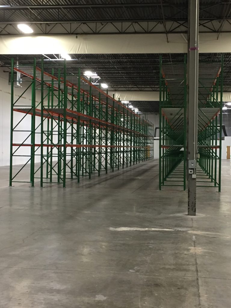 Long perspective view of pallet rack at Tellworks Communications Salt Lake City