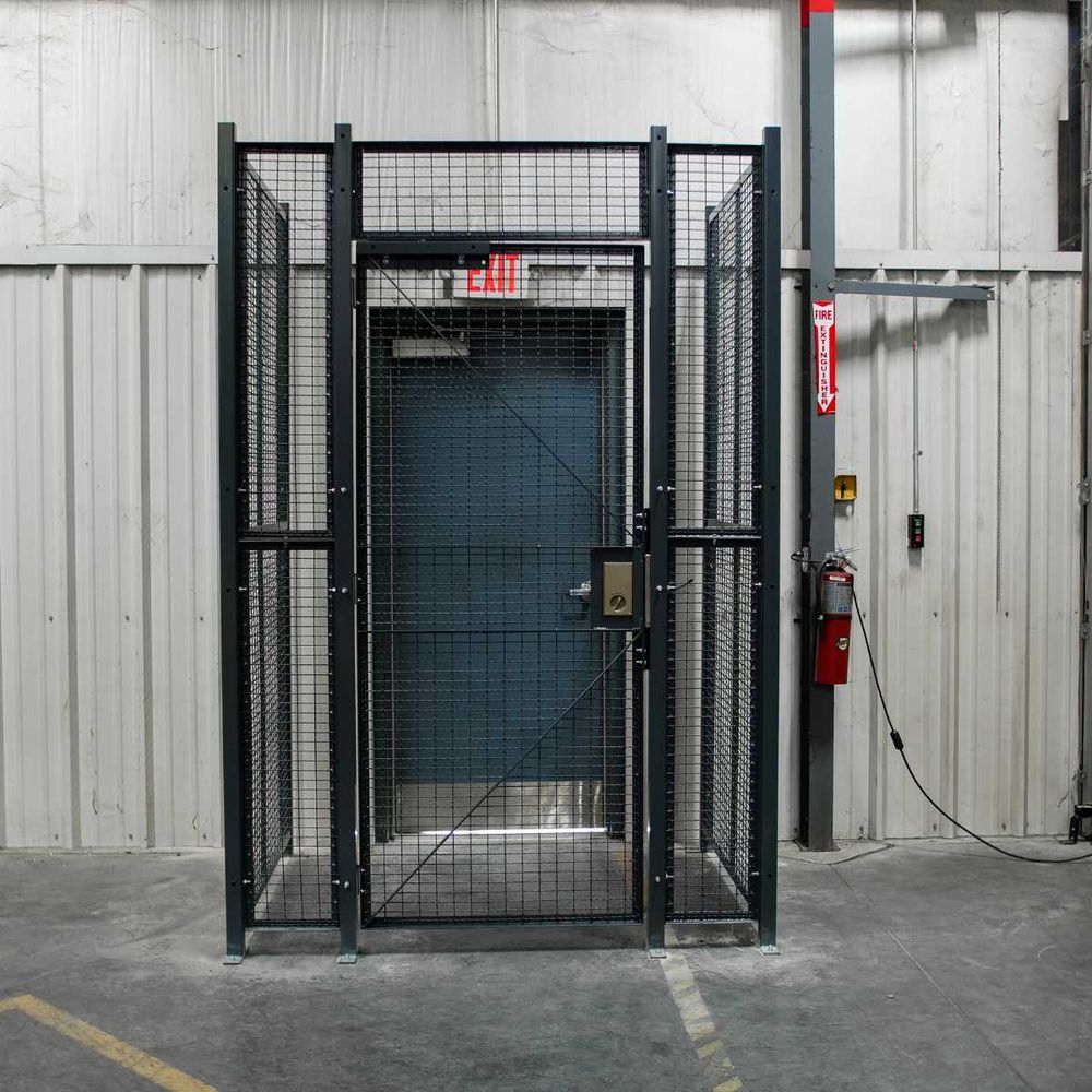 Wire mesh corridor connecting dock door to driver check-in area