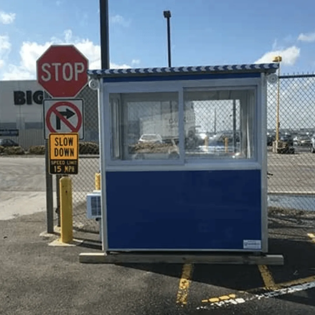 Prefabricated parking attendant booth with sliding transaction window
