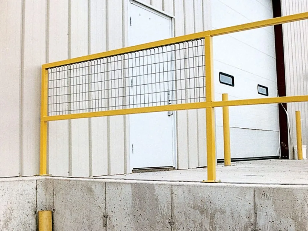 84-inch steel square safe handrail with wire mesh infill mounted on a platform edge