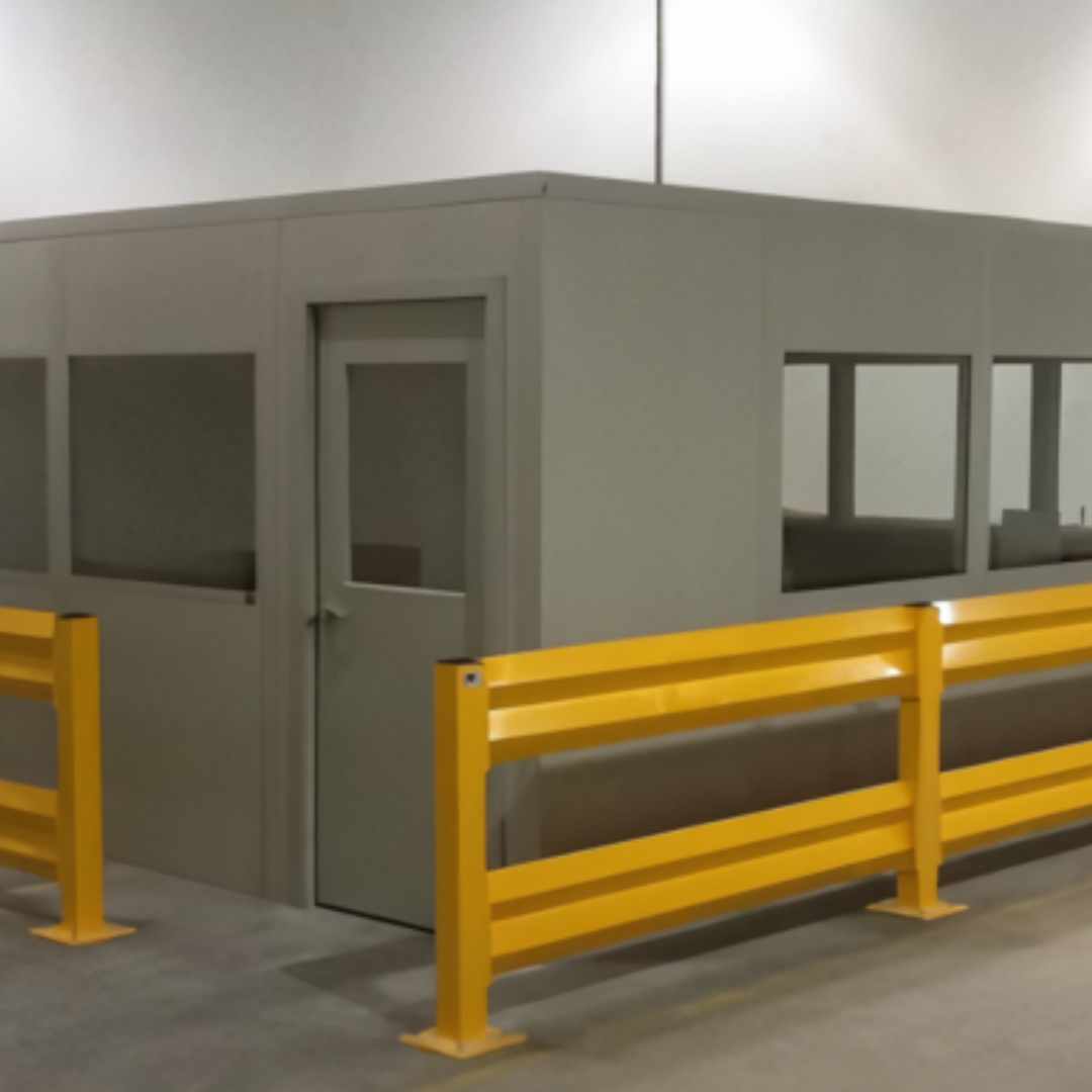 In-plant office with windows beside industrial circulation space
