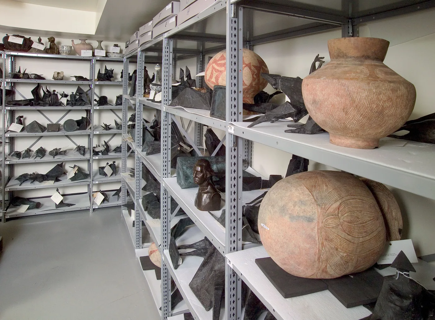Penco Clipper steel shelving holding catalogued artifacts in an institutional collection store