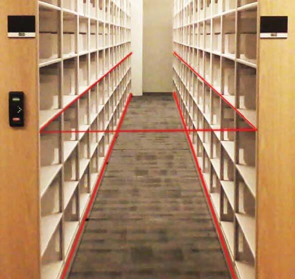 Powered mobile shelving system with controls