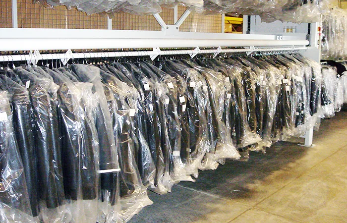 Vidir garment carousel holding bagged hanging garments for uniform and linen storage
