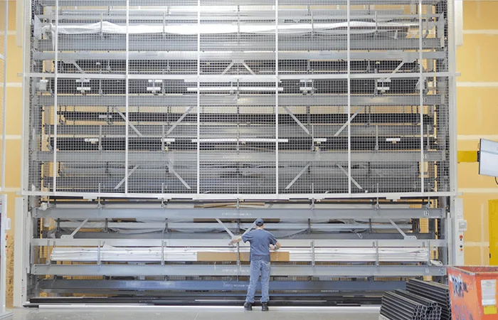 Vidir vertical carousel holding small parts trays behind an access opening