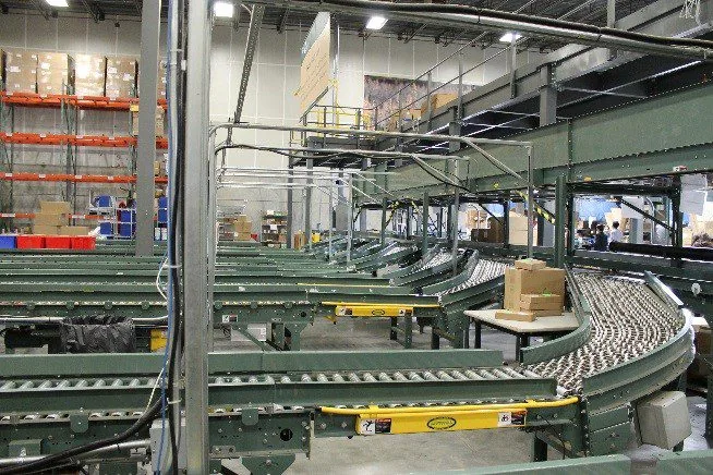 Engineered mezzanine platform installed over a conveyor line