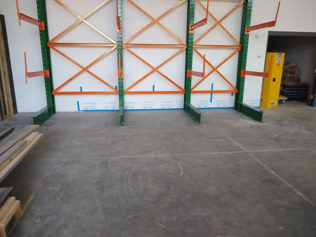 Cantilever rack installed against a wall for a Utah high school