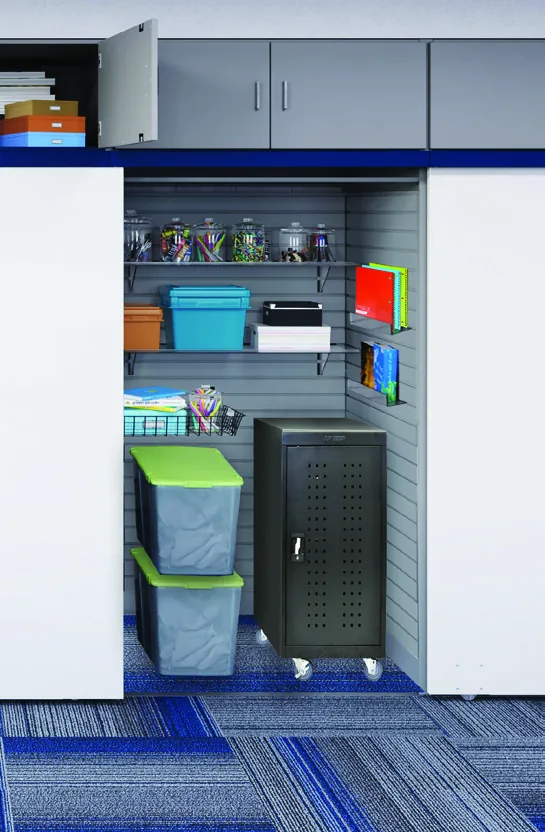 Aurora InterActivwall workshop storage module holding STEAM materials and digital tools on slat wall accessories