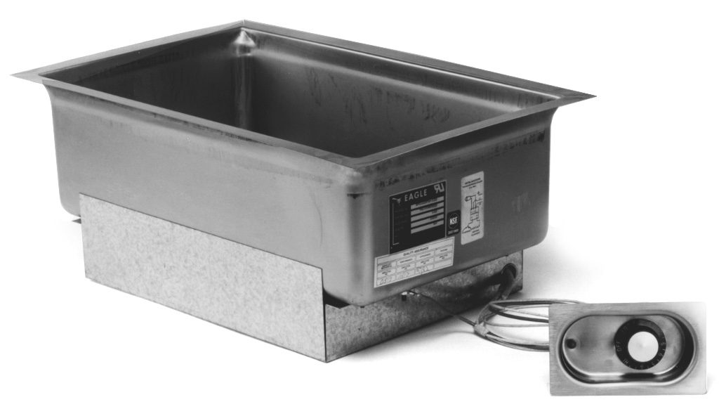 Drop-in rectangular food warmer well built into a stainless serving counter