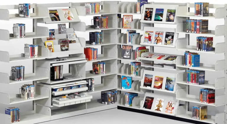 Estey cantilever library shelving corner range with sloped display shelves