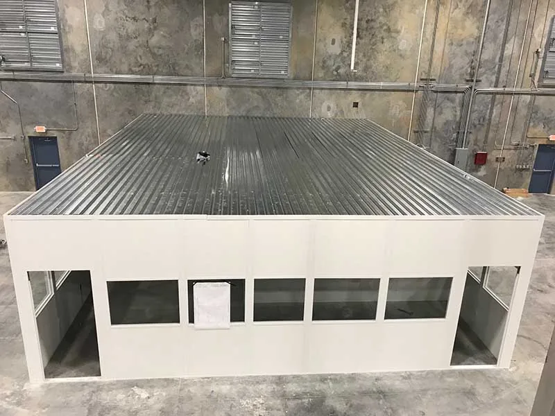 Modular in-plant office topped with a steel B-deck load-bearing roof inside an industrial building