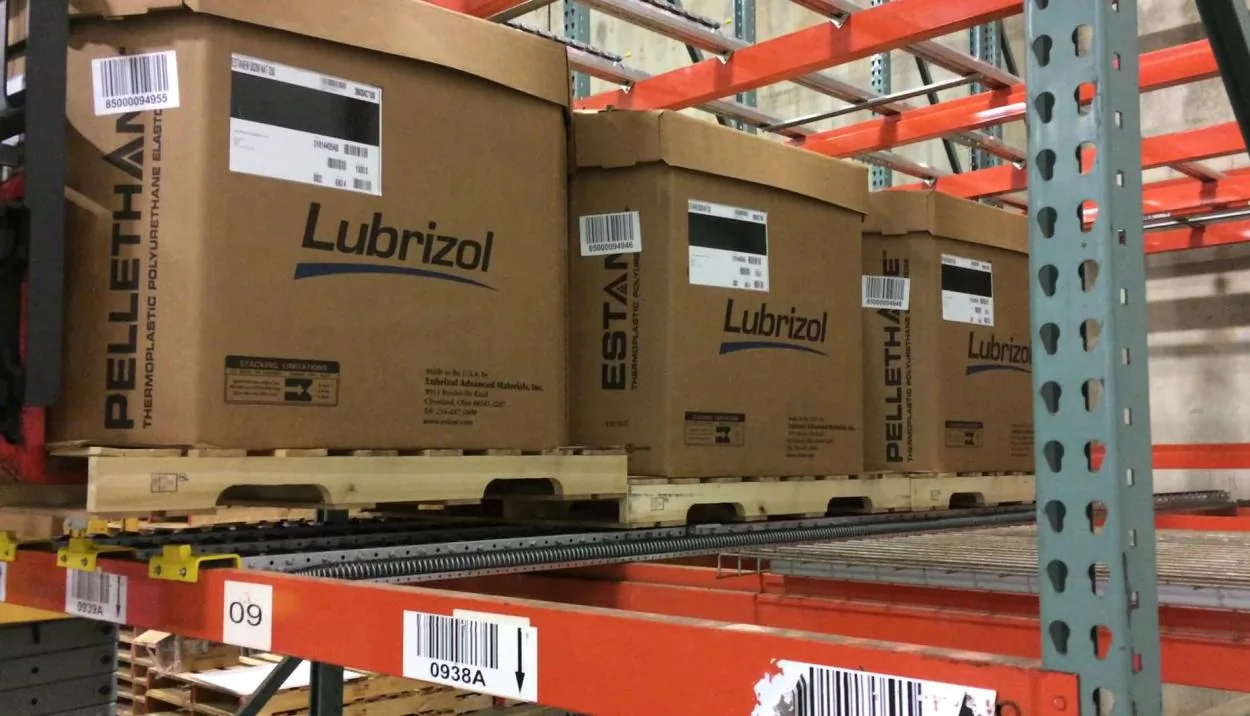 Cartoned product stored several pallets deep in a loaded pallet rack lane