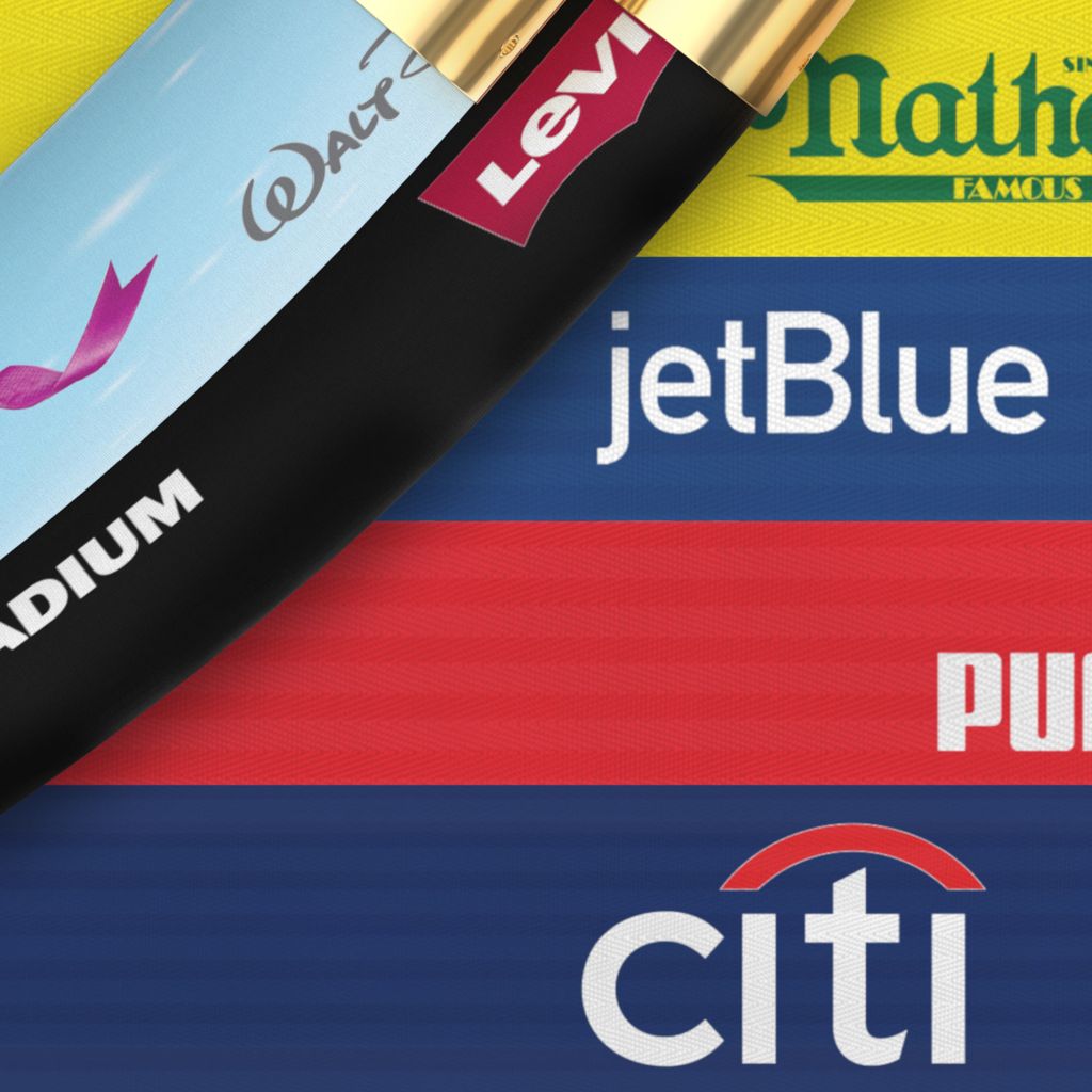 Visiontron custom printed retractable belts and panels showing full-color branded graphics