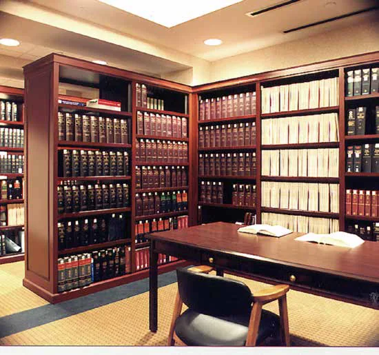 Aurora Wood-Tek wood-clad shelving holding law books in a firm library