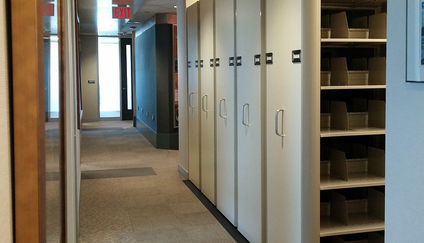 Mizer Colorado manual push-pull mobile shelving installed in an office hallway