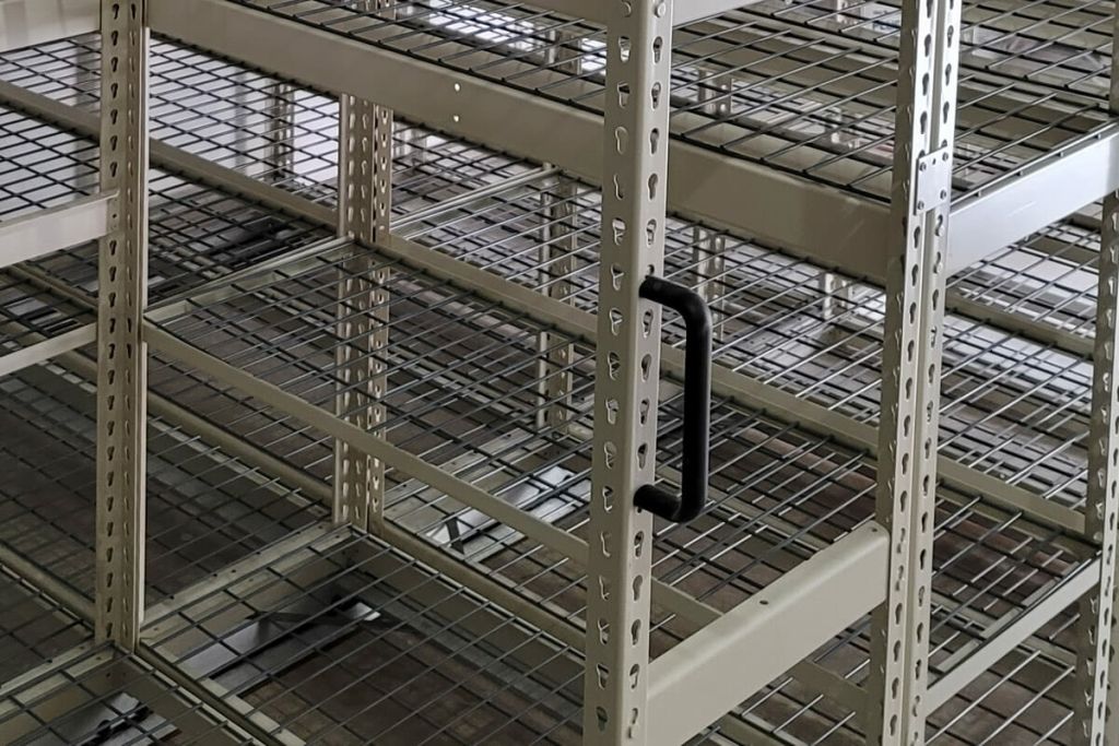 Close-up of MMI wire shelving carriage handle and shelf detail