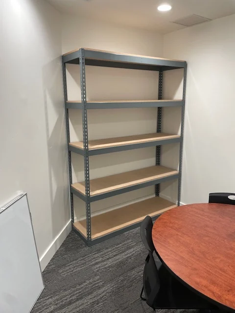 Single freestanding five-level boltless shelving unit installed in an office at Ogden Housing Authority