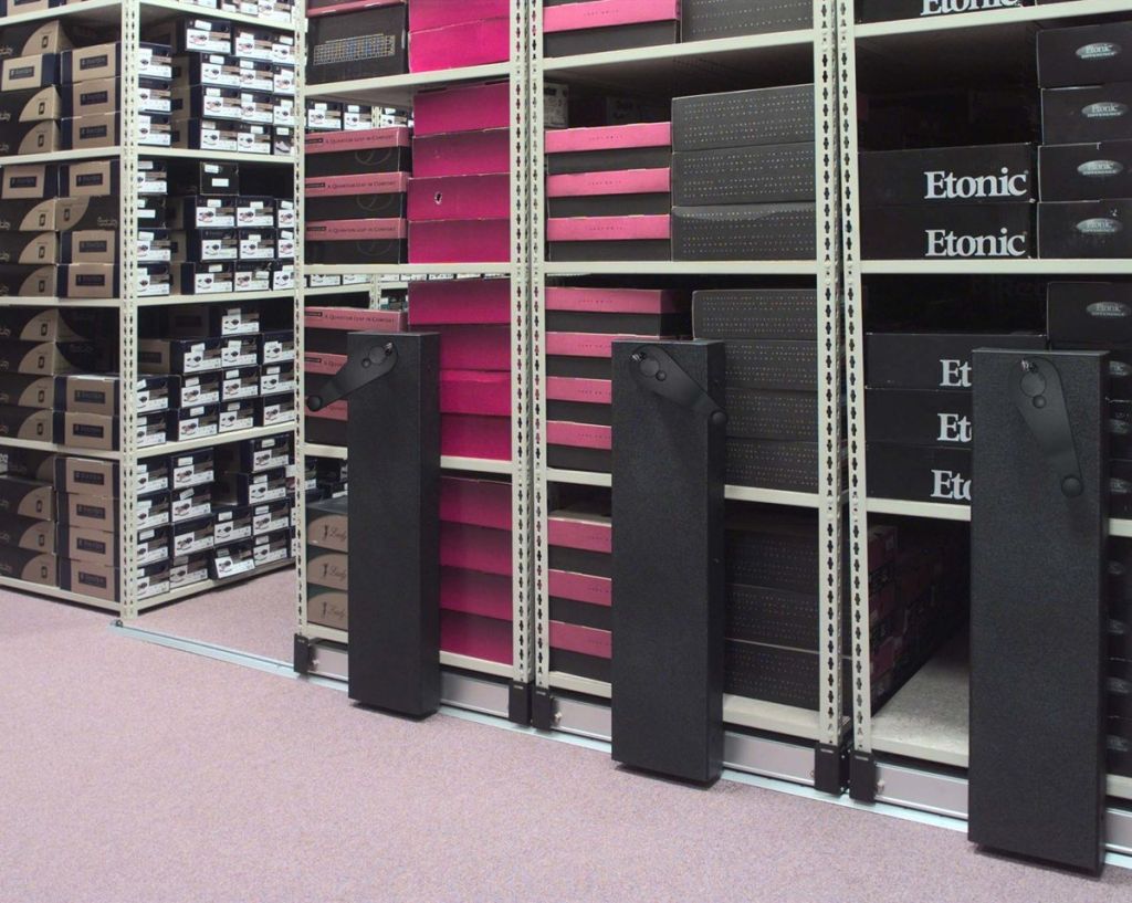 Pipp mobile shelving with mechanical handwheels and boxed retail inventory