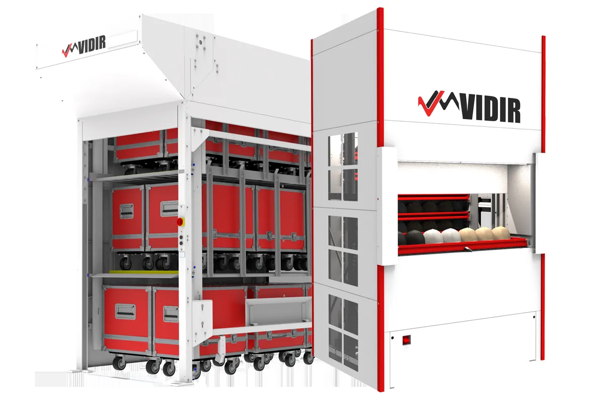 Vidir Sports Equipment Storage Lift with red wheeled team equipment trunks stored on multiple automated vertical levels