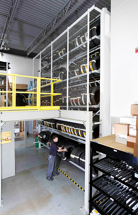 Multiple Vidir Tire Carousel units installed in a warehouse aisle