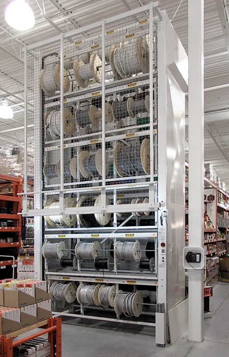 Vidir Wire Carousel installed at a manufacturer holding wire and cable spools on wire bay carriers