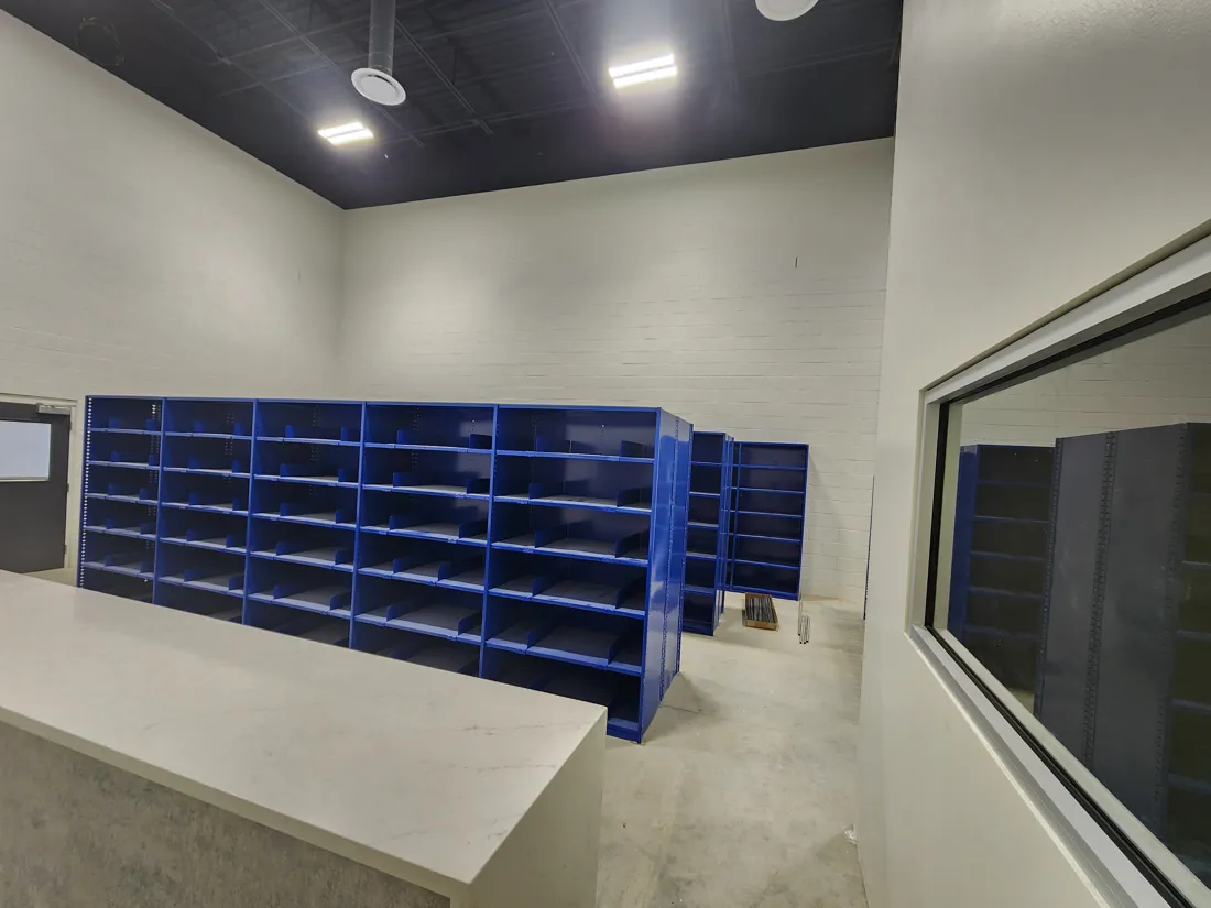 Blue Borroughs Flexi-Bin units installed behind a parts counter in South Ogden, Utah