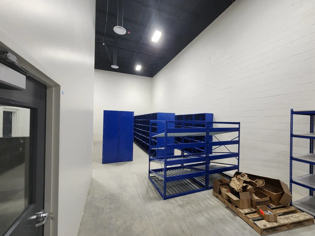 Entry to the new Young Subaru parts room with Flexi-Bin units and blue Rivet-Span shelving