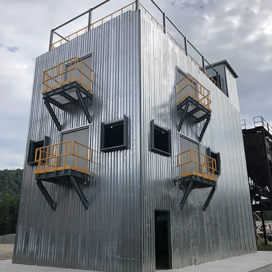 Multi-level corrugated steel training tower with window openings and small balconies