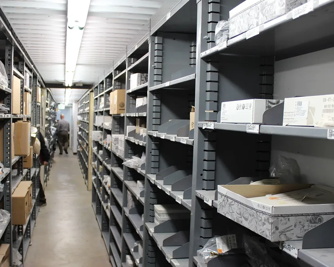 Gray Borroughs Flexi-Bin shelving aisle