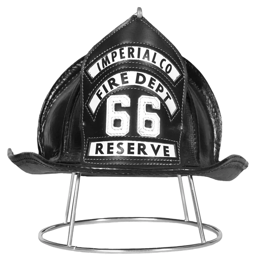 Ready Rack steel helmet holder supporting a leather fire helmet