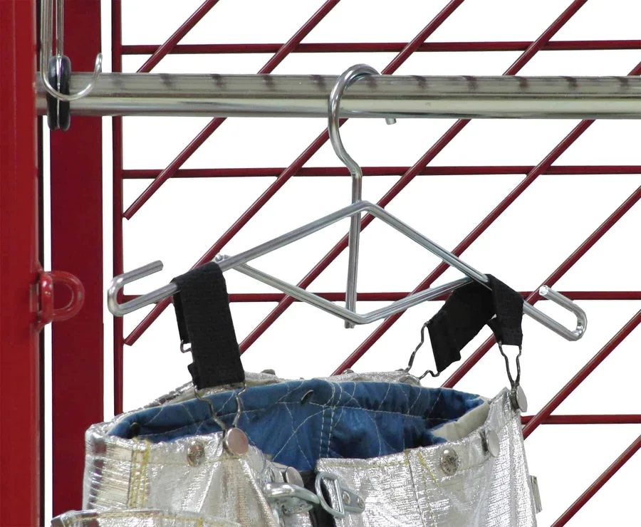 Proximity pant hanger holding bunker pants upright inside a Red Rack locker