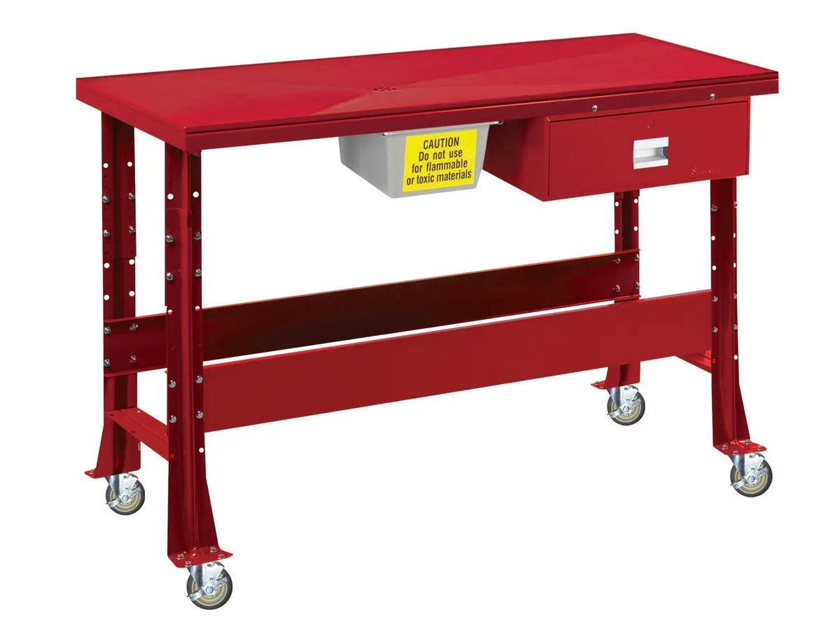 Red oversized mobile tear-down workbench with raised drip-lip top, drawer, drain bucket and locking casters