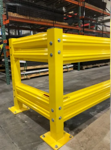 Yellow SpaceGuard AisleGuard industrial guardrail with double rails beside pallet racking