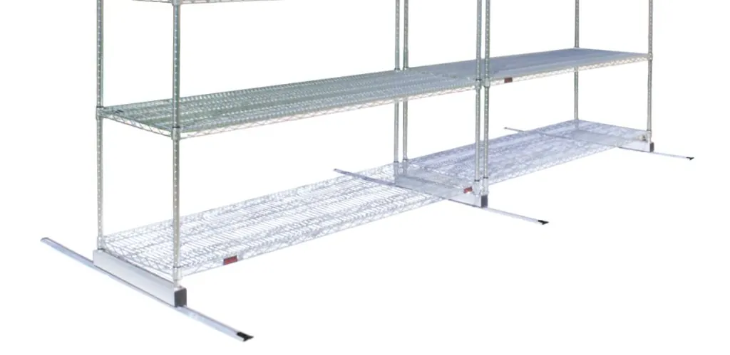 Wire shelving units mounted on a floor track for high-density central supply storage