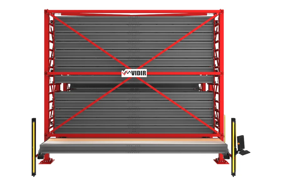 Front view of the Vidir Dual-Tower Bar Stock VLS showing stacked bar stock carriers, safety light curtains and the operator control station